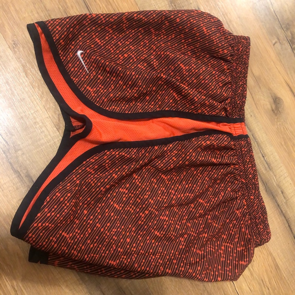 Dark orange/red nike running shorts